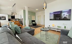 Komfort Ferienwohnungen mit Wellness-Garten - Gästehaus am Bachlauf - Losheim am See